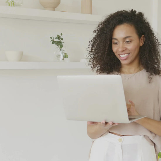 A woman excited by the quality of the Ultimate Life planner from the MyPlanova brand