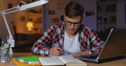 A student uses the Student planner from the MyPlanova brand while studying.